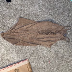 Tan body suit